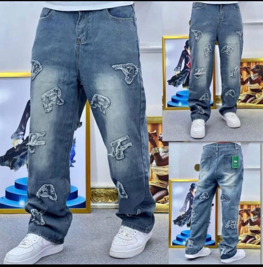 Men's Light Wash Distressed Jeans with Embossed Patterns